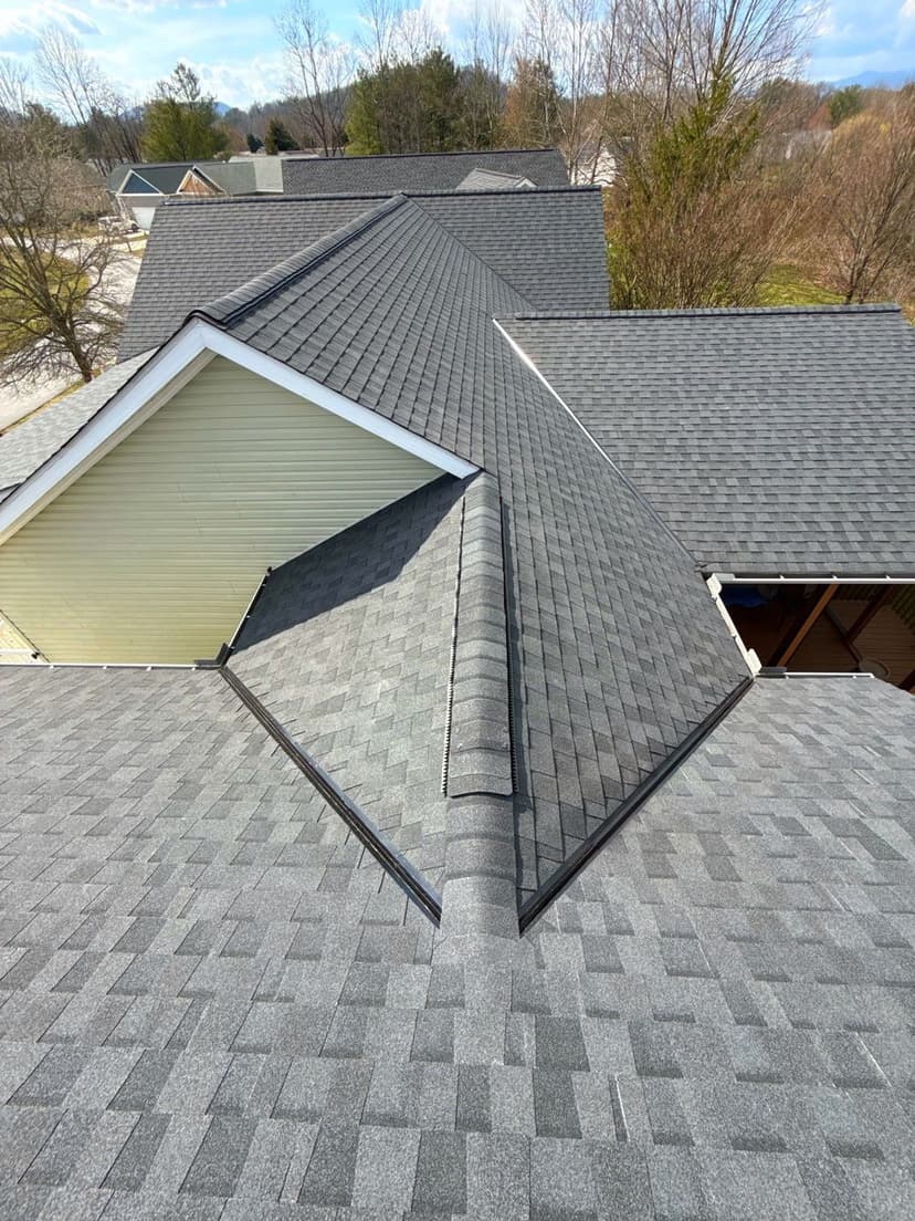 Aerial view of a gray shingle roof showcasing a clean and modern design.